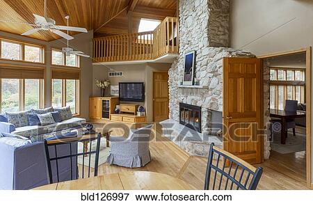 Stone fireplace in living room View Large Photo Image Stock Photo - Stone fireplace in living room. Fotosearch