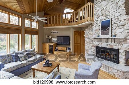 Stone fireplace in living room View Large Photo Image Stock Photo - Stone fireplace in living room. Fotosearch
