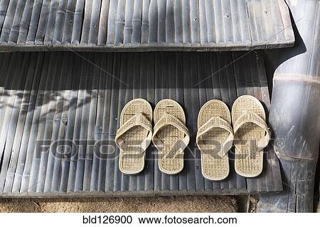 Straw flipflops on step View Large Photo Image Stock Image - Straw flipflops on step. Fotosearch
