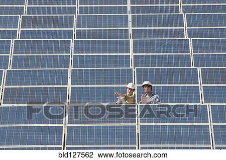 two engineers in solar power plant View Large Photo Image Stock Image - two engineers in solar power plant. Fotosearch