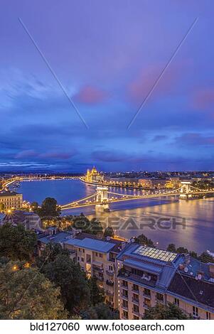 Stock Image - View of Chain Bridge illuminated at night, Budapest, Hungary. Fotosearch
