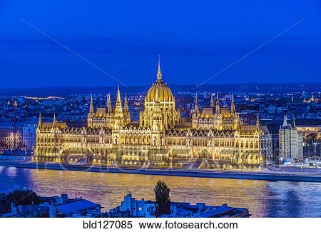 View of Parliament Building illuminated at dusk, Budapest, Hungary View Large Photo Image Stock Photography - View of Parliament Building illuminated at dusk, Budapest, Hungary. Fotosearch