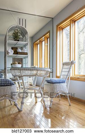 Wicker chairs and table in dining room View Large Photo Image Stock Image - Wicker chairs and table in dining room. Fotosearch