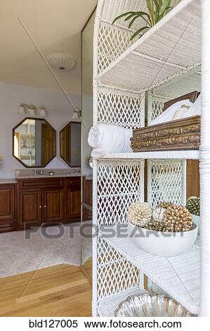 Wicker shelves outside bathroom View Large Photo Image Stock Photography - Wicker shelves outside bathroom. Fotosearch