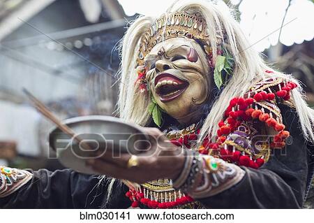 Balinese performer wearing mask and costume, Mas, Bali, Indonesia View Large Photo Image Stock Image - Balinese performer wearing mask and costume, Mas, Bali, Indonesia. Fotosearch