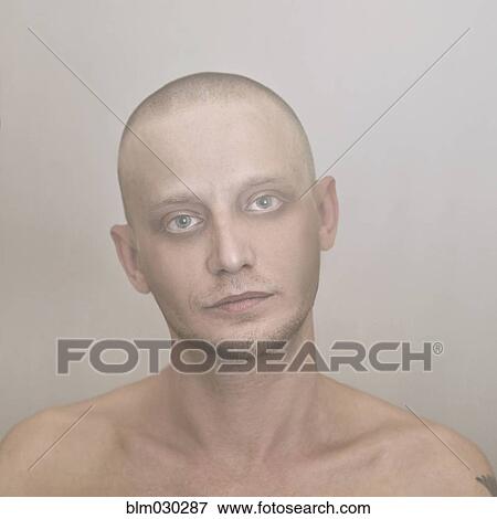 Close up of Caucasian man with shaved-head View Large Photo Image Stock Photo - Close up of Caucasian man with shaved-head. Fotosearch