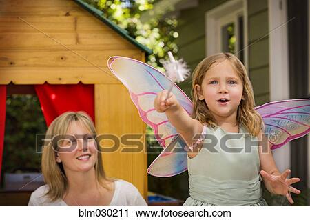 Mother and daughter in playhouse View Large Photo Image Stock Image - Mother and daughter in playhouse. Fotosearch