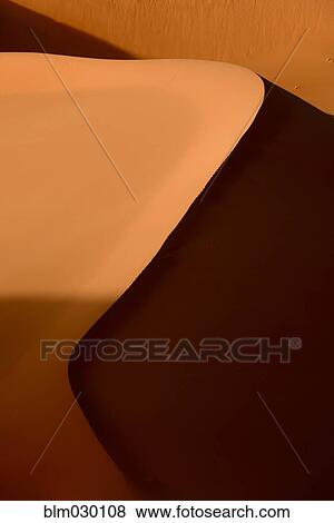 Stock Photo - Peak of sand dunes in desert, Merzouga, Kaar Es Souk, Morocco. Fotosearch