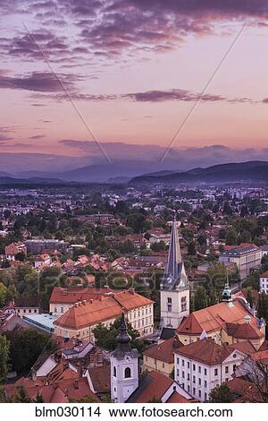Sunset over Ljubliana cityscape, Osrednje Slovenska, Slovenia View Large Photo Image Picture - Sunset over Ljubliana cityscape, Osrednje Slovenska, Slovenia. Fotosearch