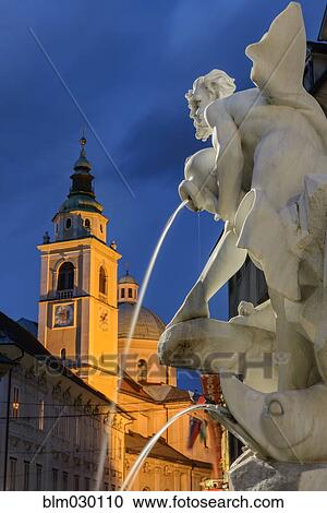Water pouring from ornate fountain in city square, Ljubljana, Osrednje Slovenska, Slovenia View Large Photo Image Stock Image - Water pouring from ornate fountain in city square, Ljubljana, Osrednje Slovenska, Slovenia. Fotosearch