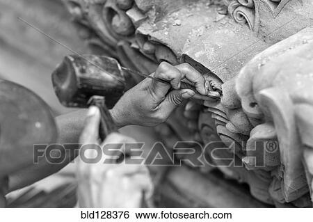 Artisan carving stone statue View Large Photo Image Stock Photograph - Artisan carving stone statue. Fotosearch