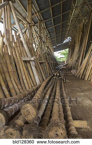 Stock Image - Bamboo trunks in factory, Ubud, Bali, Indonesia. Fotosearch