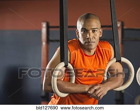 Black man resting in gym View Large Photo Image Stock Image - Black man resting in gym. Fotosearch