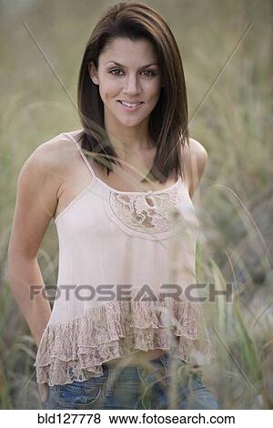 Caucasian woman smiling outdoors View Large Photo Image Stock Photo - Caucasian woman smiling outdoors. Fotosearch