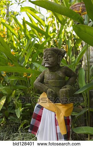 Hindu statue wrapped in fabric in garden View Large Photo Image Stock Image - Hindu statue wrapped in fabric in garden. Fotosearch