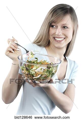 Hispanic woman eating salad View Large Photo Image Stock Photograph - Hispanic woman eating salad. Fotosearch