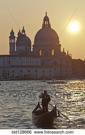 Man rowing gondola on canal, Venice, Veneto, Italy View Large Photo Image Stock Photograph - Man rowing gondola on canal, Venice, Veneto, Italy. Fotosearch