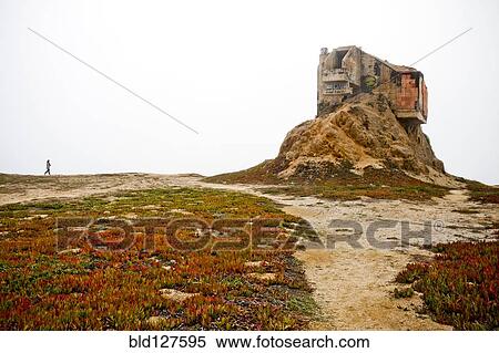 Stock Photography - Modern house built on rocky beach. Fotosearch