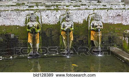 Moss growing over Hindu statues, Ubud, Bali, Indonesia View Large Photo Image Stock Photo - Moss growing over Hindu statues, Ubud, Bali, Indonesia. Fotosearch