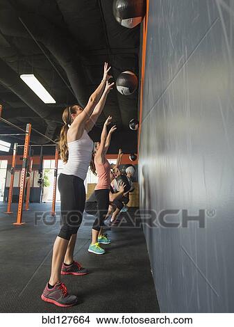 People training together in gym View Large Photo Image Picture - People training together in gym. Fotosearch