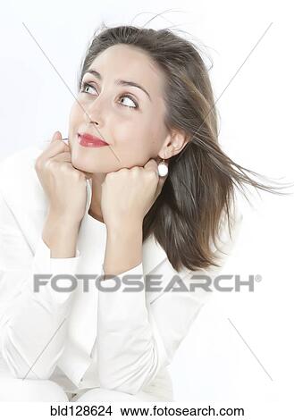 Smiling woman resting chin on hands View Large Photo Image Picture - Smiling woman resting chin on hands. Fotosearch