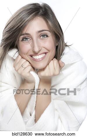 Smiling woman wrapped in bathrobe View Large Photo Image Stock Image - Smiling woman wrapped in bathrobe. Fotosearch