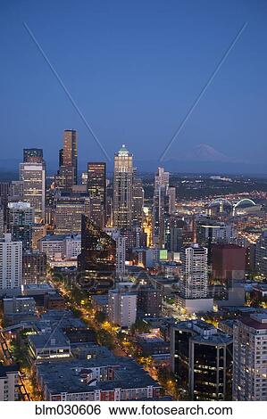 Aerial view of Seattle skyline lit up at night, Washington, United States View Large Photo Image Stock Photograph - Aerial view of Seattle skyline lit up at night, Washington, United States. Fotosearch