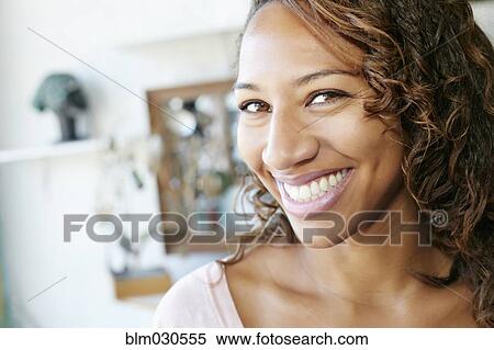 African American woman smiling in store View Large Photo Image Stock Photography - African American woman smiling in store. Fotosearch