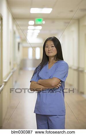 Japanese Nurse Standing In Hospital Corridor Stock Photo Blm Fotosearch