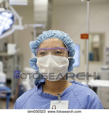 Japanese surgeon standing in operating room View Large Photo Image Stock Image - Japanese surgeon standing in operating room. Fotosearch