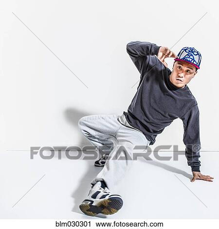 Mixed race dancer casting shadows on wall View Large Photo Image Stock Image - Mixed race dancer casting shadows on wall. Fotosearch