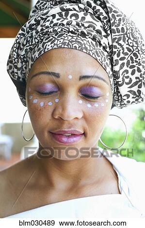 Mixed race woman wearing turban View Large Photo Image Stock Photo - Mixed race woman wearing turban. Fotosearch