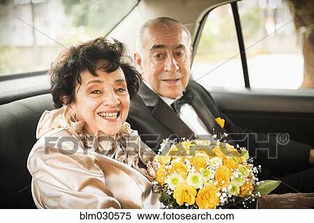 Senior newlywed couple riding in car View Large Photo Image Stock Photography - Senior newlywed couple riding in car. Fotosearch