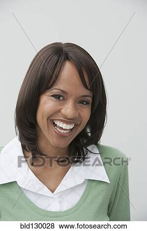 Stock Photo - African American businesswoman smiling. Fotosearch
