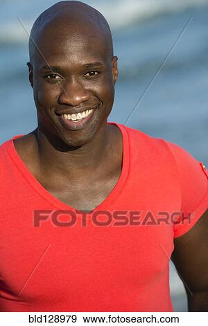 African American man smiling outdoors View Large Photo Image Stock Photo - African American man smiling outdoors. Fotosearch