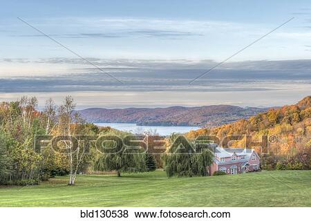 Bed and breakfast overlooking autumn leaves and lake View Large Photo Image Stock Photo - Bed and breakfast overlooking autumn leaves and lake. Fotosearch