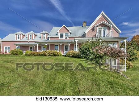 Bed and breakfast overlooking sunny yard View Large Photo Image Stock Photography - Bed and breakfast overlooking sunny yard. Fotosearch