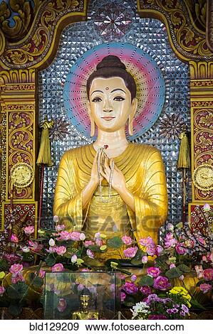 Stock Photo - Buddha statue in Dhammikarama Burmese temple, George Town, Penang, Malaysia. Fotosearch