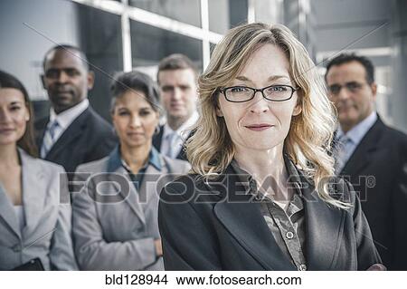 Business people smiling outdoors View Large Photo Image Picture - Business people smiling outdoors. Fotosearch