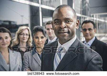 Business people smiling outdoors View Large Photo Image Stock Image - Business people smiling outdoors. Fotosearch