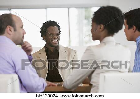 Business people talking in meeting View Large Photo Image Picture - Business people talking in meeting. Fotosearch