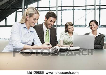 Business people talking in meeting View Large Photo Image Stock Photography - Business people talking in meeting. Fotosearch