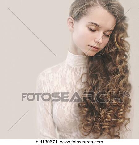 Calm Caucasian girl with long hair View Large Photo Image Stock Image - Calm Caucasian girl with long hair. Fotosearch