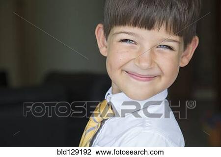 Caucasian boy smiling in formal wear View Large Photo Image Stock Image - Caucasian boy smiling in formal wear. Fotosearch