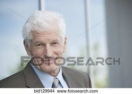 Picture - Caucasian businessman smiling. Fotosearch