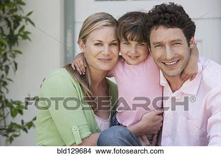 Caucasian family smiling outdoors View Large Photo Image Picture - Caucasian family smiling outdoors. Fotosearch