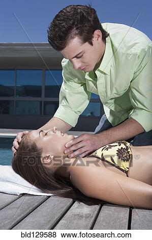 Caucasian man giving woman CPR View Large Photo Image Stock Photo - Caucasian man giving woman CPR. Fotosearch
