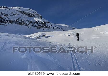 Caucasian skier in snowy landscape View Large Photo Image Stock Photo - Caucasian skier in snowy landscape. Fotosearch
