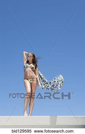 Caucasian woman wearing bikini outdoors View Large Photo Image Stock Photography - Caucasian woman wearing bikini outdoors. Fotosearch