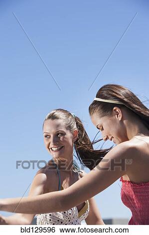 Caucasian women dancing outdoors View Large Photo Image Stock Photograph - Caucasian women dancing outdoors. Fotosearch